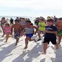 Summer Fun Unleashed: Family Beach Runs Energize Local Communities
