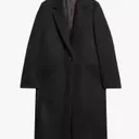 Recreating Carolyn Bessette-Kennedy's Iconic Wardrobe from 'Love Story'