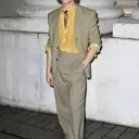 Connor Storrie's Style Evolution: Embracing the Statement Bag for SNL Debut