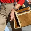 Victoria Beckham's Statement Accessory at Paris Fashion Week