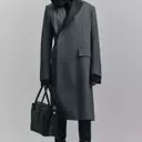 Sacai's Fall 2026 Ready-to-Wear: A Focus on Versatility and Hybridity