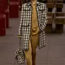 Harry Styles' Unexpected Fashion Statement: The 'Old Lady' Chanel Bag