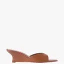 The Resurgence of Wedge Mules: A Spring 2026 Trend Spotlight