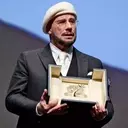 John Travolta's Emotional Acceptance of the Honorary Palme d'Or at Cannes