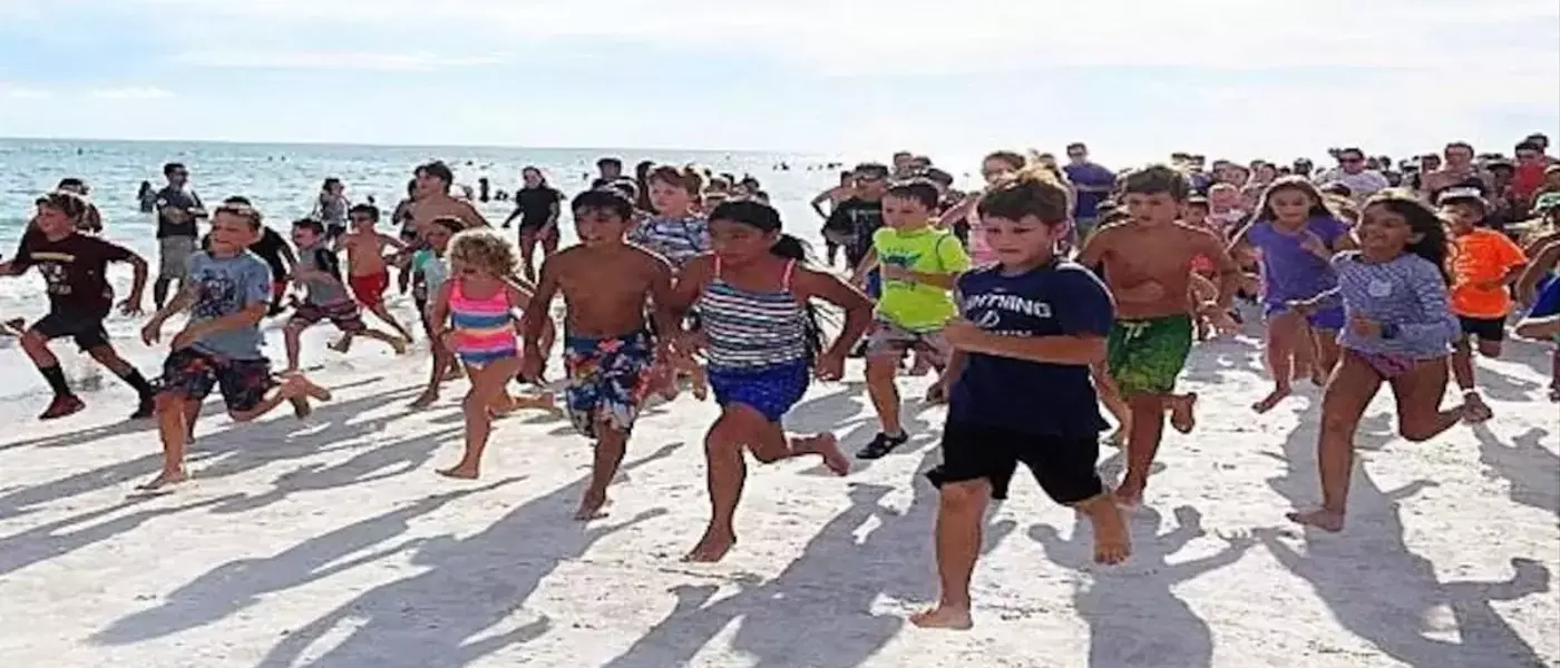 Summer Fun Unleashed: Family Beach Runs Energize Local Communities