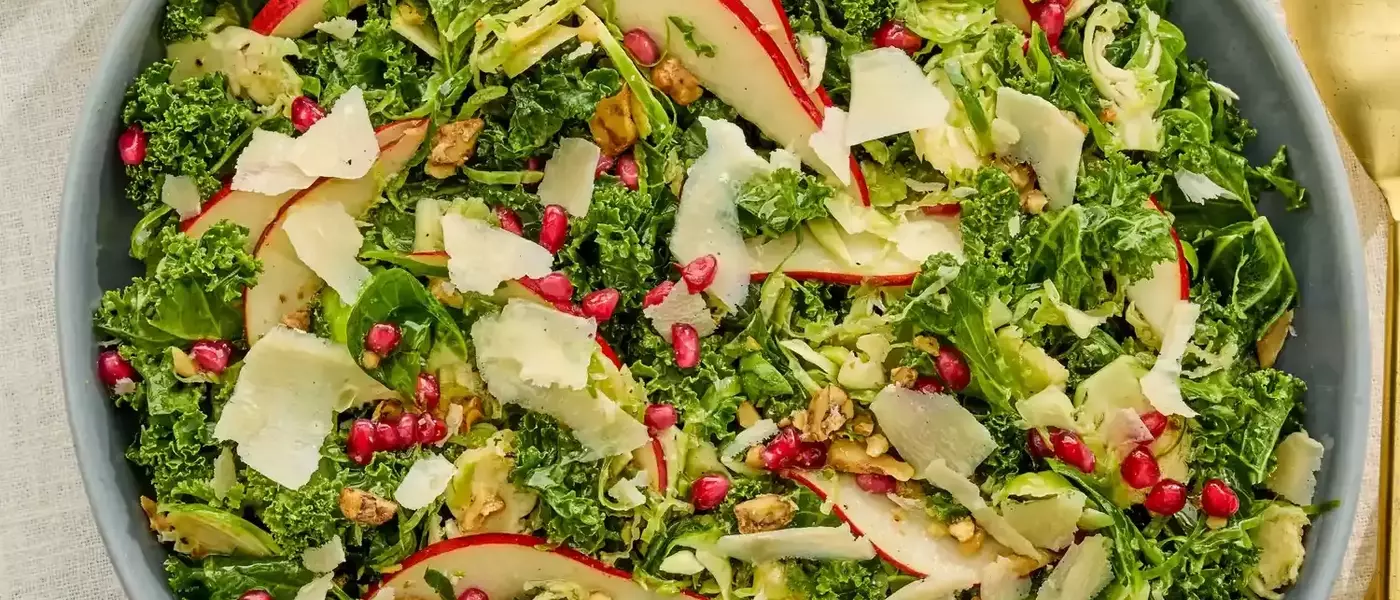 Festive Brussels Sprout, Kale, and Pear Salad with Cider Vinaigrette
