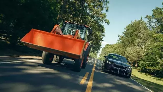 2025 BMW M5 vs. 2025 Kubota M5-111: A Comparative Review