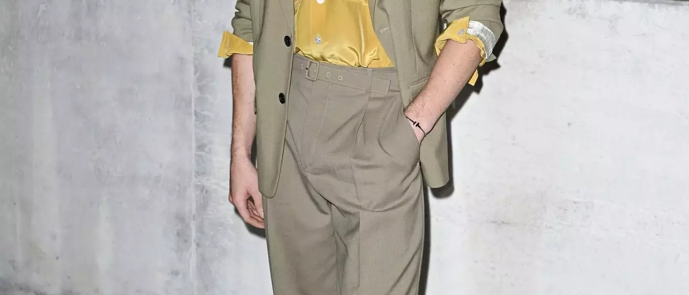 Connor Storrie's Style Evolution: Embracing the Statement Bag for SNL Debut