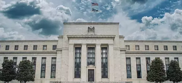 Federal Reserve's Expanding Balance Sheet and Debt Absorption Challenges