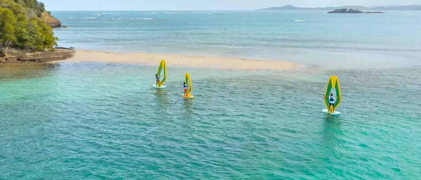 Maîtriser la Planche à Voile : Équilibre, Technique et Sécurité