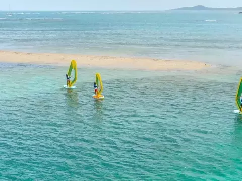 Maîtriser la Planche à Voile : Équilibre, Technique et Sécurité